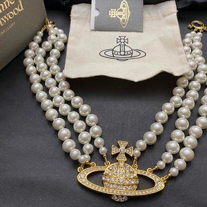 Vivienne Westwood Saturn Choker 3 Strands of Pearls in Gold Tone